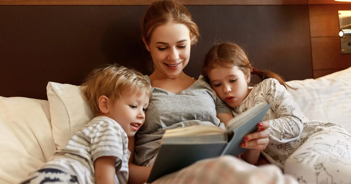 mum and children read book about an absent dad